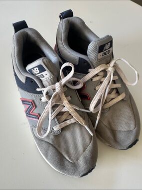 New Balance Grey Sneakers with Navy and Red Accents